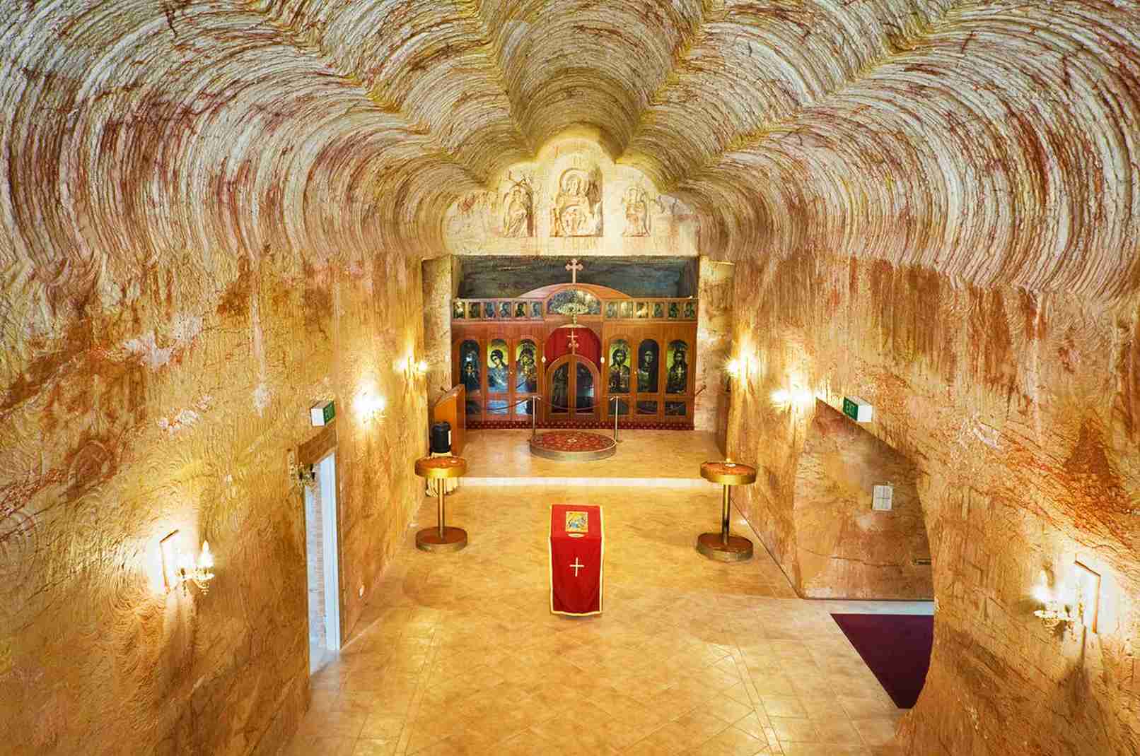 Beautiful underground church interior in Coober Pedy, Australia. | Elite Rail Journey